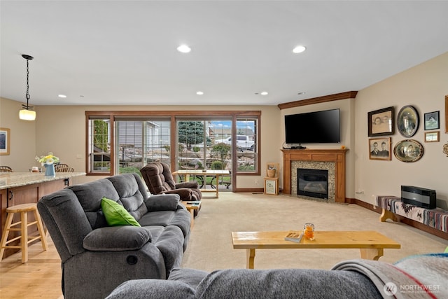 1051 N Baker Unit B104, East Wenatchee, WA 98802 - living area featuring recessed lighting, baseboards, and a fireplace with flush hearth