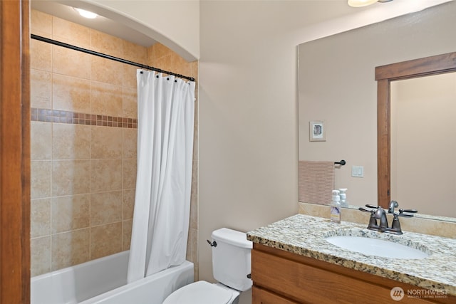 1051 N Baker Unit B104, East Wenatchee, WA 98802 - bathroom featuring vanity, shower / bath combo with shower curtain, and toilet