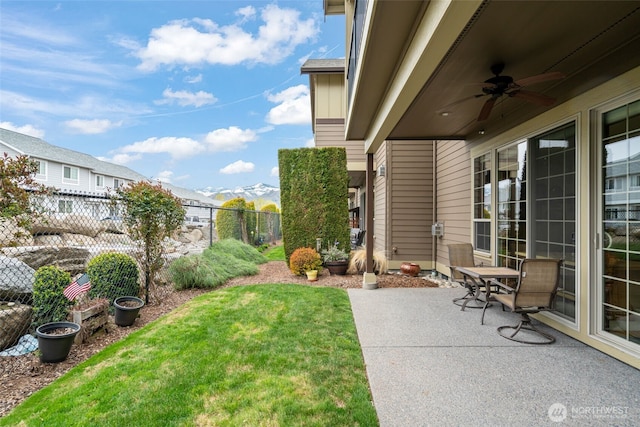 1051 N Baker Unit B104, East Wenatchee, WA 98802 - view of yard with a patio area and a ceiling fan