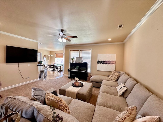 523 N Paxson Dr, Moses Lake, WA 98837 - living area with ceiling fan, baseboards, carpet flooring, and ornamental molding