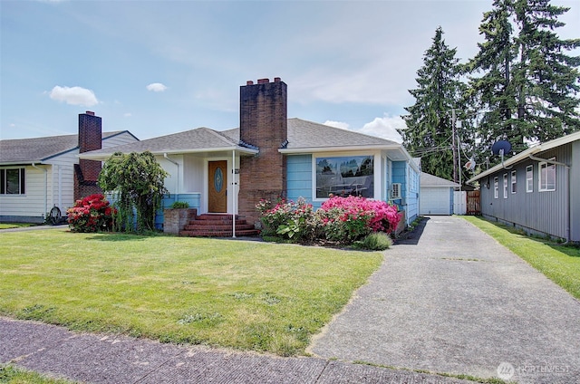 2787 Maryland St, Longview, WA 98632 - view of front of property with a front yard, a detached garage, a chimney, an outdoor structure, and a shingled roof