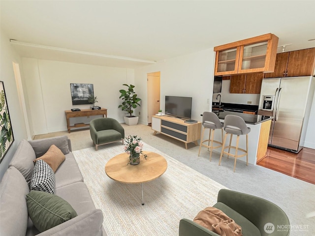 1105 Spring St Unit 904, Seattle, WA 98104 - living area featuring light colored carpet