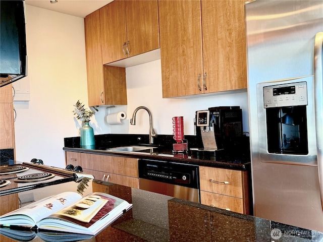 1105 Spring St Unit 904, Seattle, WA 98104 - kitchen featuring stainless steel refrigerator with ice dispenser, a sink, dishwashing machine, dark stone counters, and brown cabinetry