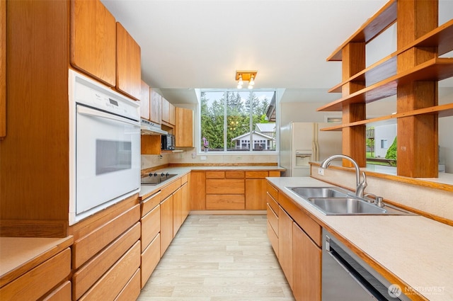 2103 106th St SW, Everett, WA 98204 - kitchen featuring white appliances, a sink, light wood-style flooring, and open shelves