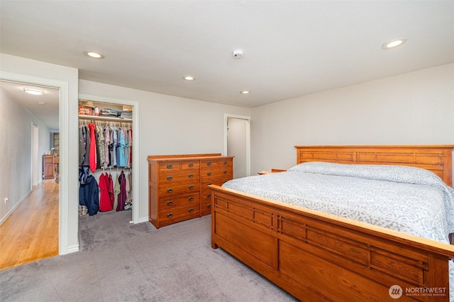 2103 106th St SW, Everett, WA 98204 - bedroom with recessed lighting, a closet, light carpet, a walk in closet, and baseboards