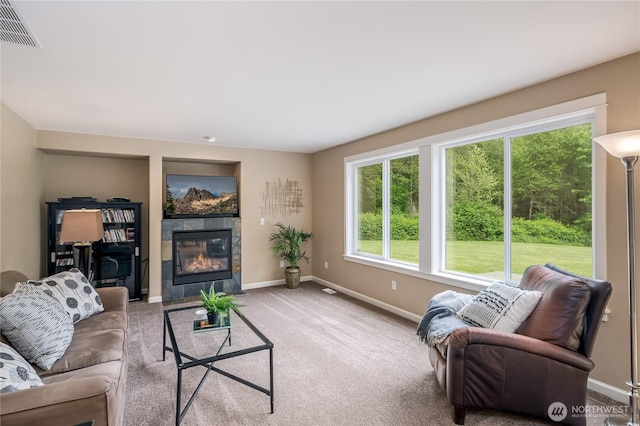 5215 E Lake Bosworth Dr, Snohomish, WA 98290 - living room featuring baseboards, a tile fireplace, and carpet flooring