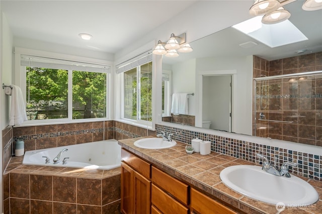 5215 E Lake Bosworth Dr, Snohomish, WA 98290 - full bath with a skylight, a whirlpool tub, a shower stall, double vanity, and healthy amount of natural light