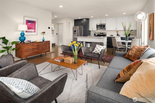 4321 S Webster St # E, Seattle, WA 98118 - living area featuring recessed lighting and dark wood-style flooring