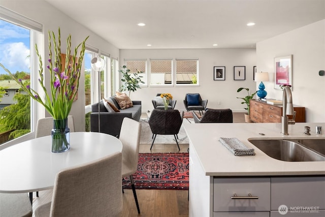 4321 S Webster St # E, Seattle, WA 98118 - dining room featuring wood finished floors and recessed lighting