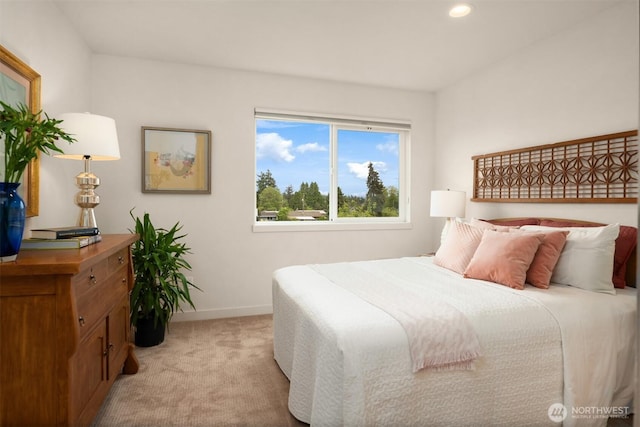 4321 S Webster St # E, Seattle, WA 98118 - bedroom featuring light colored carpet, baseboards, and recessed lighting