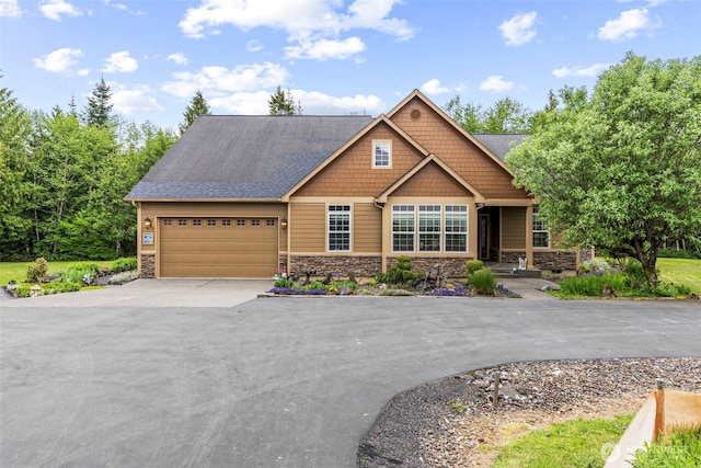 108 Reynolds Rd, Castle Rock, WA 98611 - craftsman inspired home with stone siding, driveway, and an attached garage