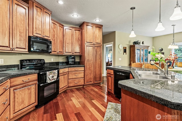 108 Reynolds Rd, Castle Rock, WA 98611 - kitchen with black appliances, tile counters, a sink, dark wood-style floors, and recessed lighting