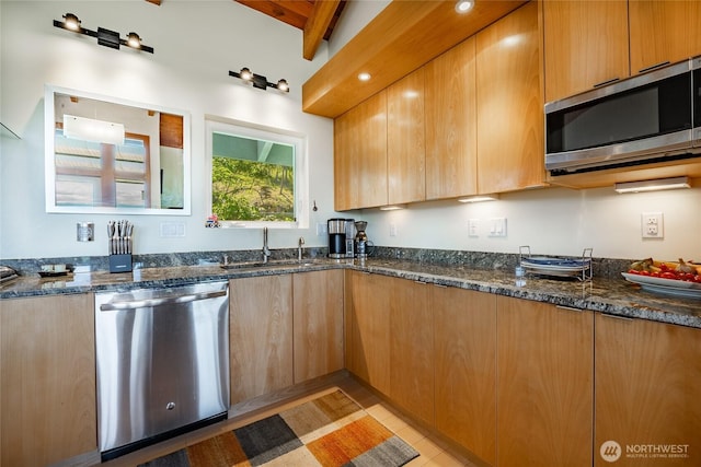 1116 Island Dr, Lummi Island, WA 98262 - kitchen with stainless steel appliances, a sink, and dark stone counters