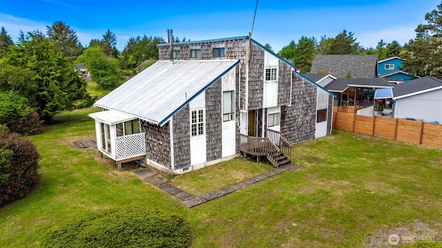 257 Point Brown Ave SW, Ocean Shores, WA 98569 - rear view of property with metal roof