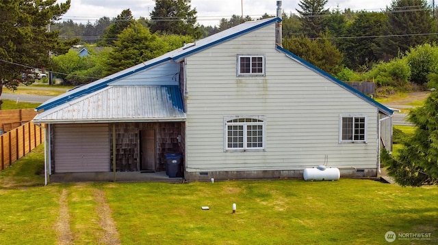 257 Point Brown Ave SW, Ocean Shores, WA 98569 - back of property featuring crawl space and driveway
