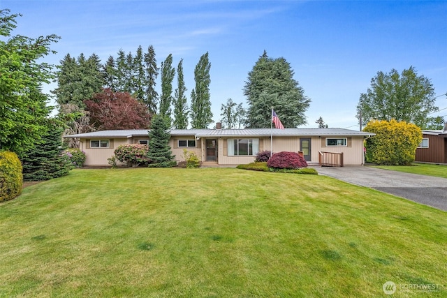 3801 Mayberry Rd, Centralia, WA 98531 - ranch-style house with driveway, a front yard, metal roof, and a chimney
