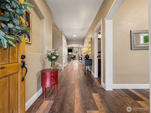 20714 61st St E, Bonney Lake, WA 98391 - entryway with hardwood / wood-style flooring, baseboards, and arched walkways