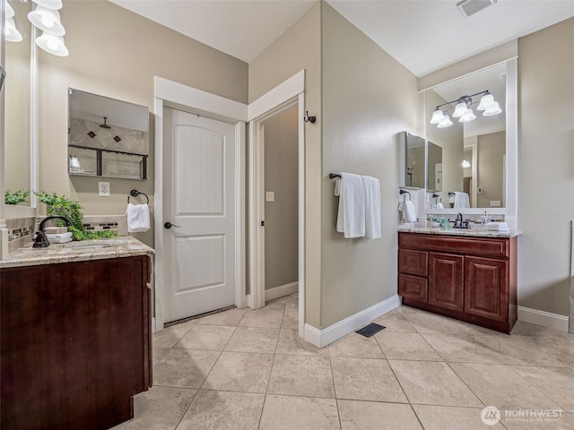 20714 61st St E, Bonney Lake, WA 98391 - full bathroom with vanity, tile patterned floors, and baseboards