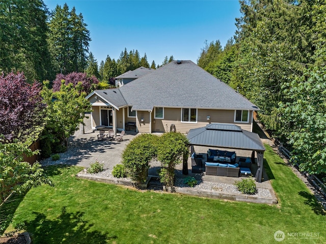 20714 61st St E, Bonney Lake, WA 98391 - back of property with an outdoor hangout area, a patio area, a gazebo, and roof with shingles