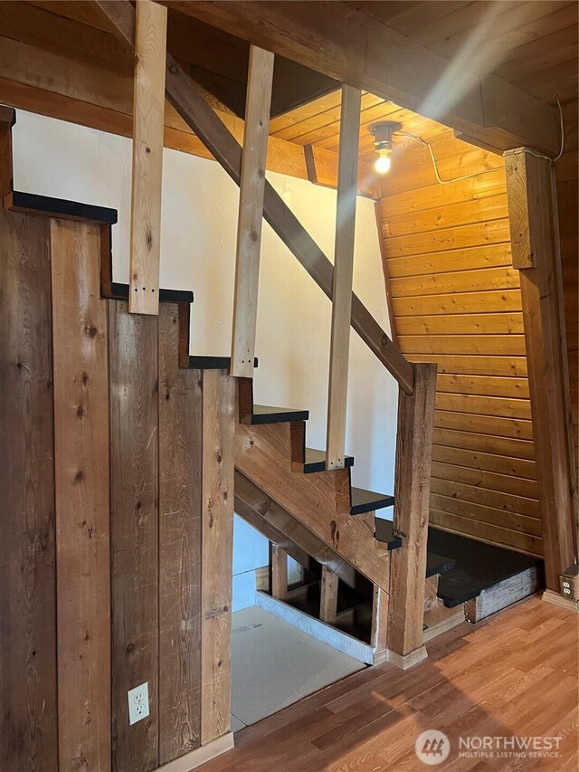 28 N Fir St, Omak, WA 98841 - stairway with wood finished floors and wood walls