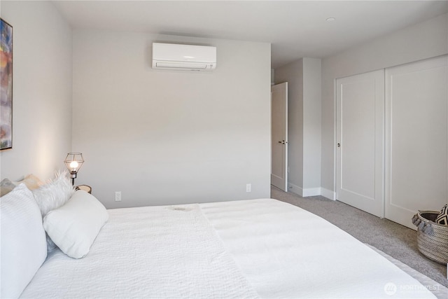 825 238th Pl SE Unit D, Bothell, WA 98021 - bedroom featuring a wall mounted AC, carpet flooring, baseboards, and a closet