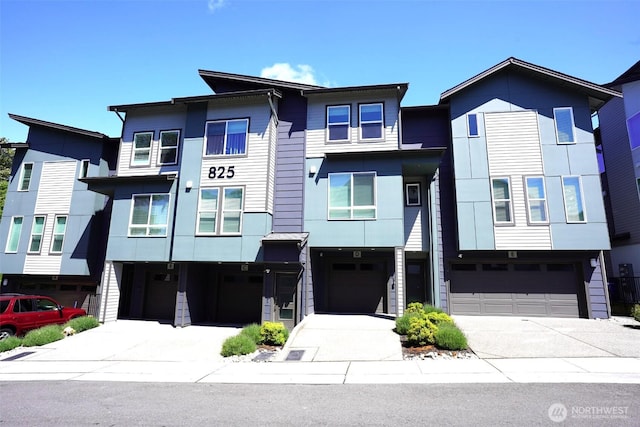 825 238th Pl SE Unit D, Bothell, WA 98021 - view of front facade with a garage and driveway