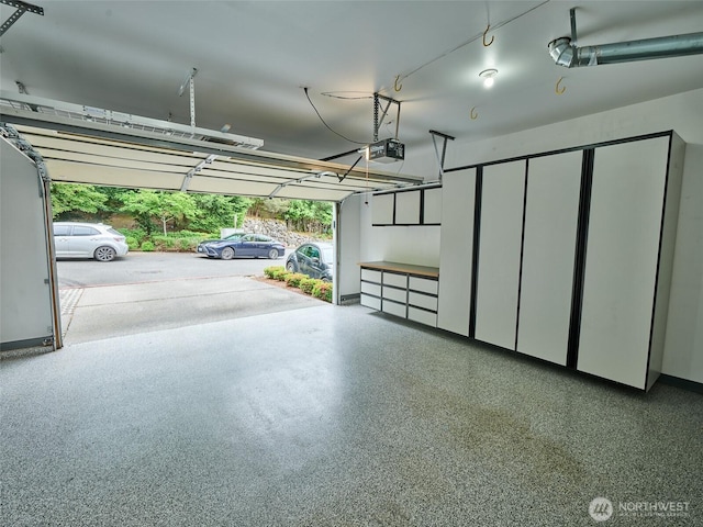 6941 134th Ct SE Unit B, Newcastle, WA 98059 - garage featuring a garage door opener