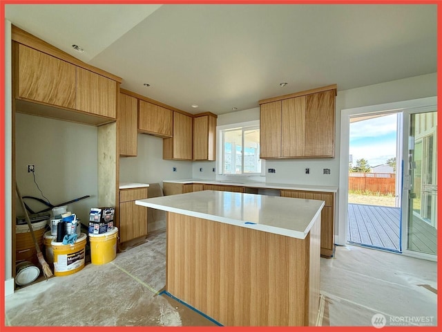 455 N Portal Loop SW, Ocean Shores, WA 98569 - kitchen with a center island, light countertops, and a sink