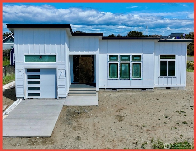 455 N Portal Loop SW, Ocean Shores, WA 98569 - view of front facade with board and batten siding