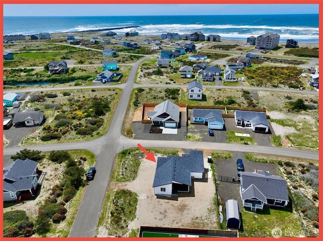 455 N Portal Loop SW, Ocean Shores, WA 98569 - aerial view of residential area with a large body of water
