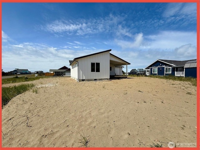 455 N Portal Loop SW, Ocean Shores, WA 98569 - rear view of house featuring crawl space