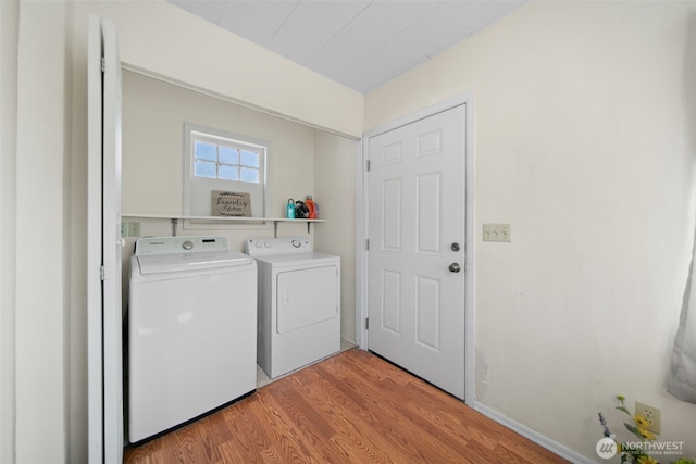 21500 US-97, Orondo, WA 98843 - laundry room with separate washer and dryer and light wood finished floors