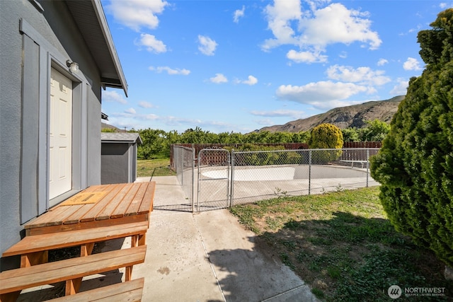 21500 US-97, Orondo, WA 98843 - view of yard featuring a mountain view and a gate