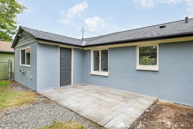 5705 241st St SW, Mountlake Terrace, WA 98043 - rear view of property with a patio and a shingled roof