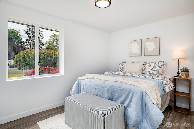 5705 241st St SW, Mountlake Terrace, WA 98043 - bedroom with crown molding, baseboards, and wood finished floors