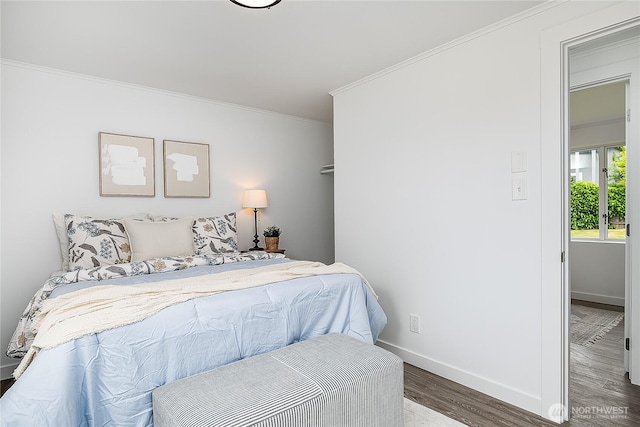 5705 241st St SW, Mountlake Terrace, WA 98043 - bedroom featuring wood finished floors, crown molding, and baseboards