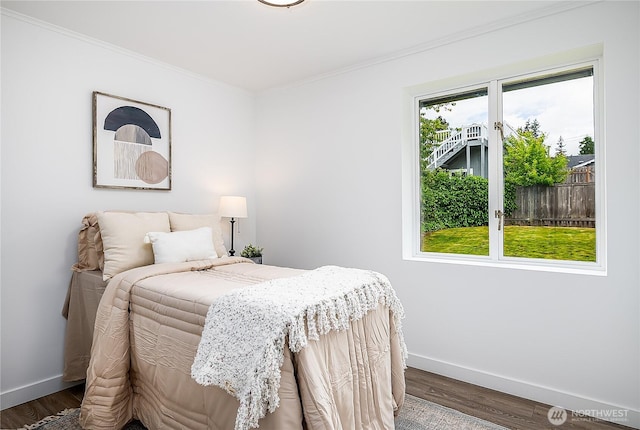 5705 241st St SW, Mountlake Terrace, WA 98043 - bedroom with baseboards, crown molding, and wood finished floors