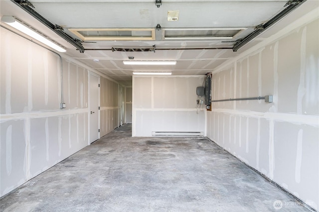 5705 241st St SW, Mountlake Terrace, WA 98043 - garage featuring a baseboard heating unit