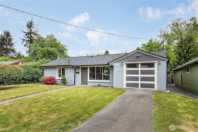 5705 241st St SW, Mountlake Terrace, WA 98043 - view of front of house with a garage, asphalt driveway, a front yard, and a shingled roof
