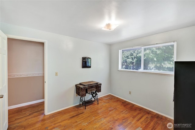 10208 28th Ave SW, Seattle, WA 98146 - empty room featuring wood finished floors and baseboards