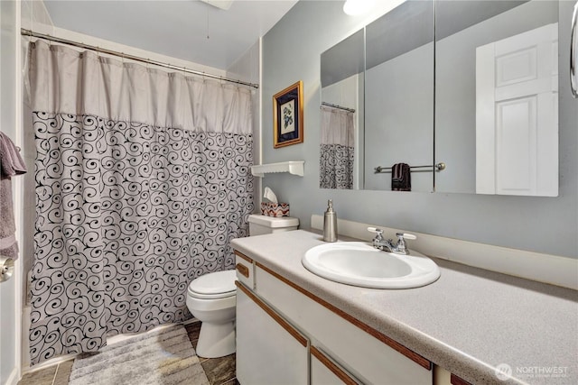 10208 28th Ave SW, Seattle, WA 98146 - full bathroom with toilet, vanity, and curtained shower