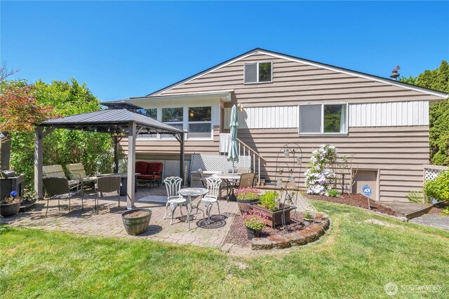 10208 28th Ave SW, Seattle, WA 98146 - rear view of property featuring outdoor lounge area, a gazebo, a patio area, and a lawn