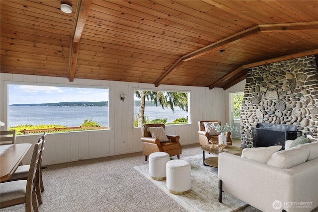 3115 Saratoga Rd, Langley, WA 98260 - living room with wooden ceiling, a stone fireplace, a water view, and carpet floors