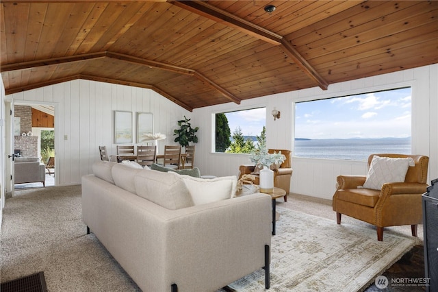 3115 Saratoga Rd, Langley, WA 98260 - living area with vaulted ceiling, carpet floors, wooden ceiling, a water view, and wooden walls