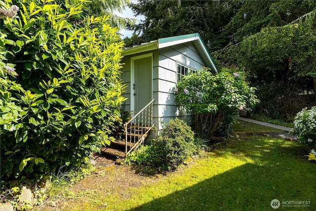 3115 Saratoga Rd, Langley, WA 98260 - view of side of home featuring a yard and an outbuilding