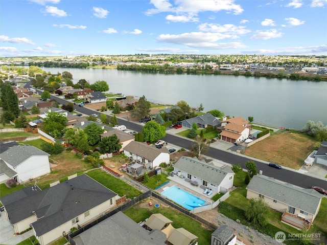 1032 Edgewater Ln, Moses Lake, WA 98837 - aerial view of residential area with a large body of water and a pool area