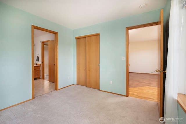 161 W Whidbey Ave Unit 4, Oak Harbor, WA 98277 - unfurnished bedroom featuring carpet floors and a closet