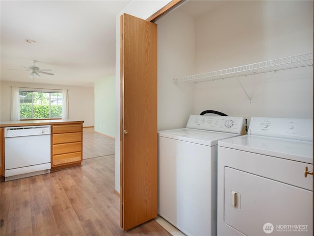 161 W Whidbey Ave Unit 4, Oak Harbor, WA 98277 - washroom featuring light wood-style flooring, ceiling fan, and washing machine and dryer