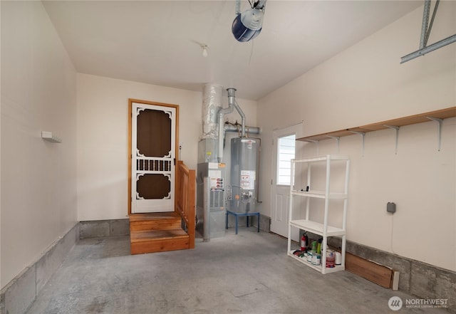 161 W Whidbey Ave Unit 4, Oak Harbor, WA 98277 - garage with gas water heater and a garage door opener