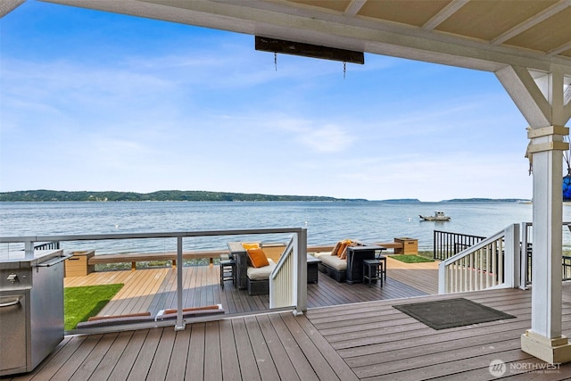 8116 Naketa Beach Walk, Mukilteo, WA 98275 - wooden deck with a water view